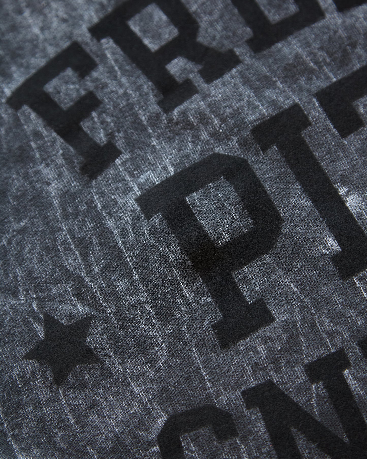 Free pit sniffs -black flock on acid washed black tshirt