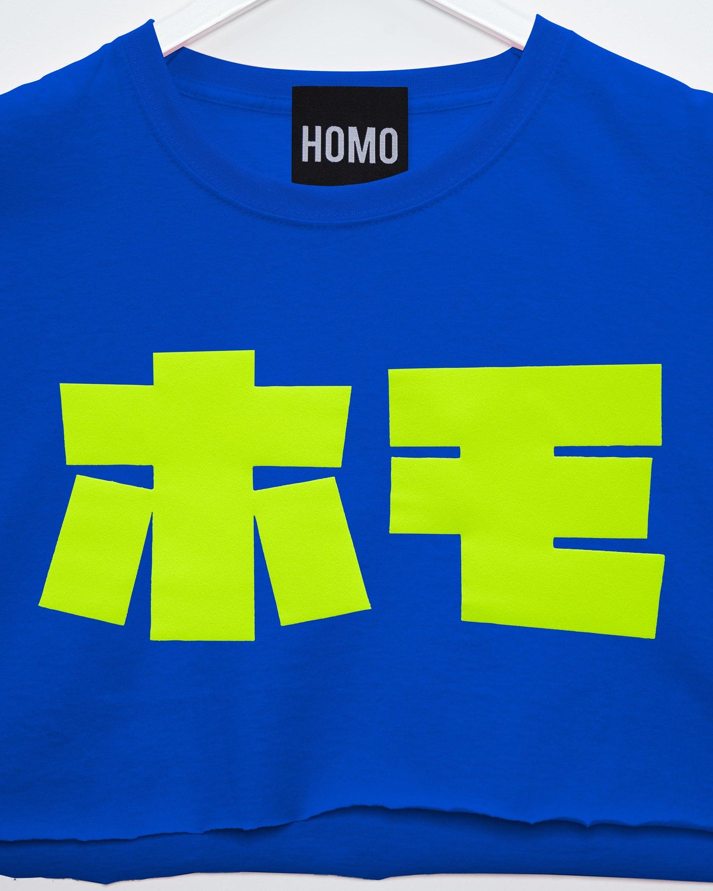 Fluorescent yellow flock HOMO in Japanese - blue crop top