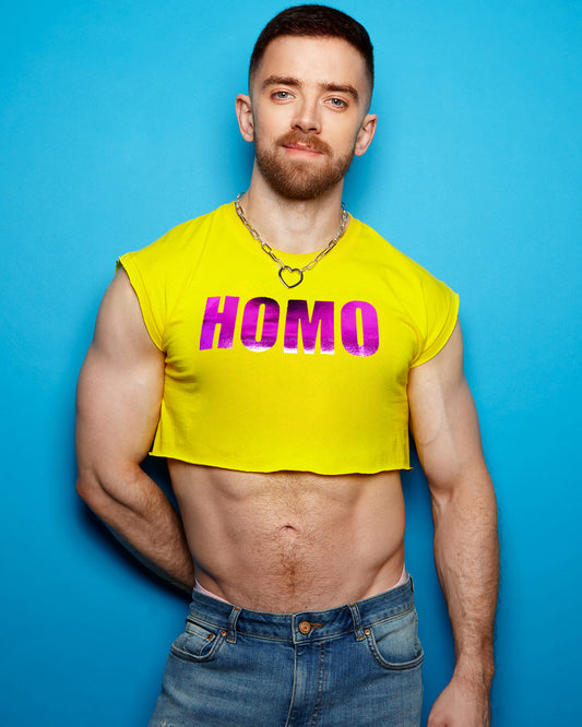 Metallic purple HOMO on white sleeveless crop-top.