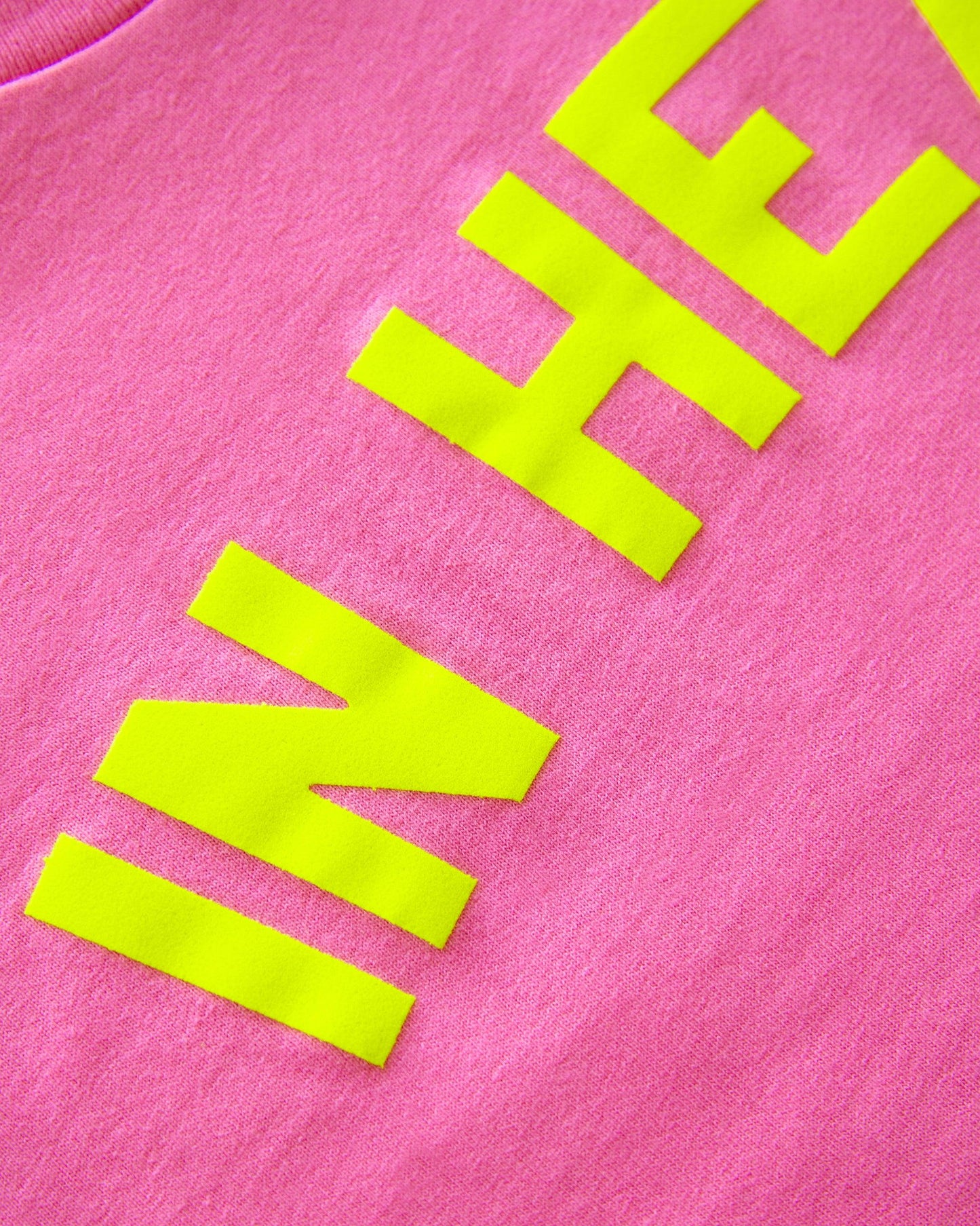 Fluorescent yellow flock In Heat - pink crop top