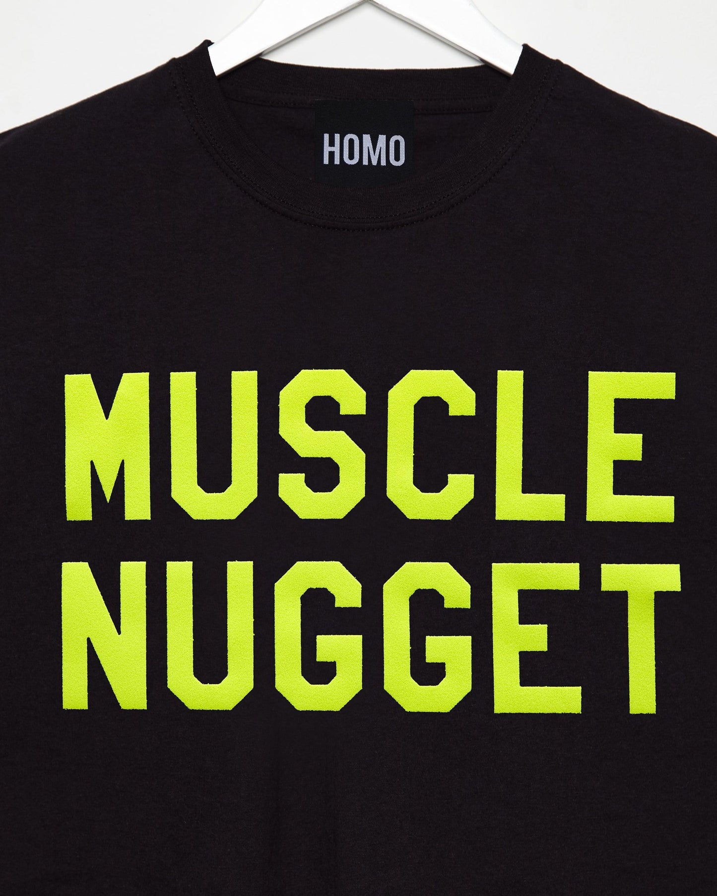 Fluorescent yellow flock muscle nugget - black tshirt