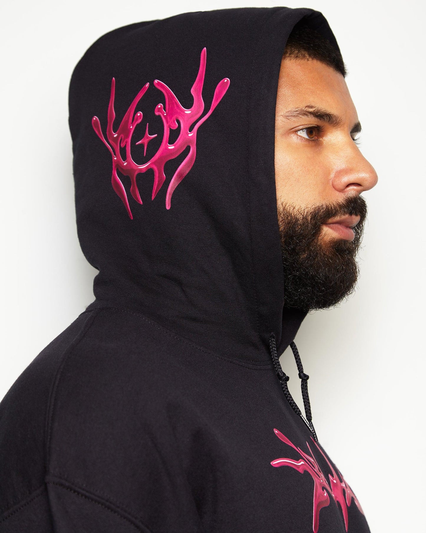 NXS011: Metallic pink style print on black oversized pullover hoodie.