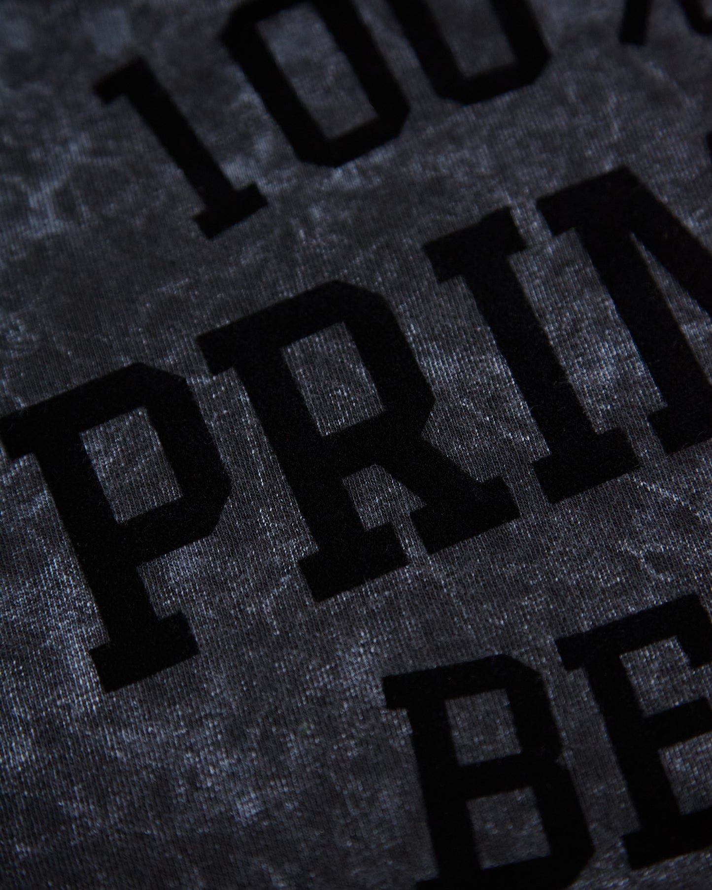 100% Prime Beef - black flock on stone washed black tshirt